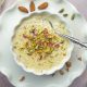 طـرز تهیه فرنی با آرد برنج برای دو نفر ؛ دسر خوشمزه و مقوی برای افطار | چه کار کنیم فرنی دون دون و گلوله‌ای نشود ؟